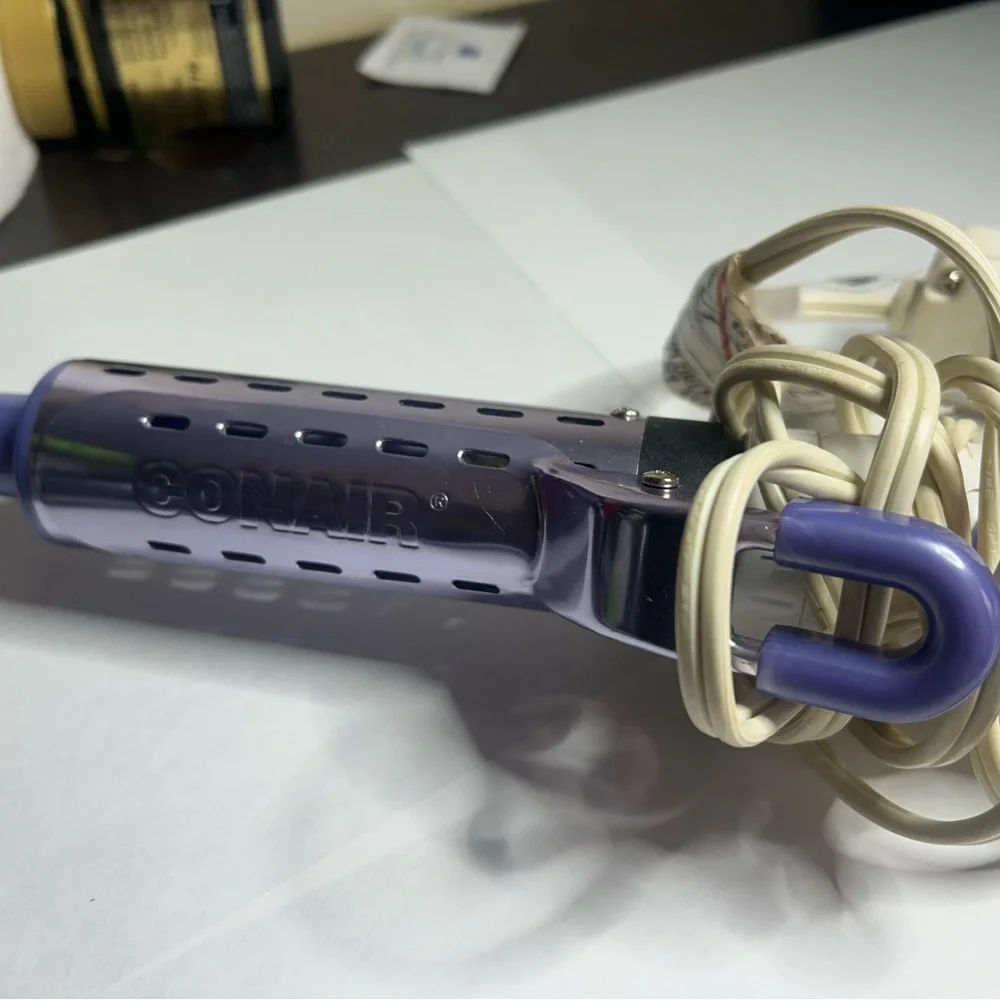 White and purple Hair Styling Tool